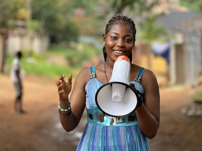 Edwina doing community sensitisation on SGBV in her community